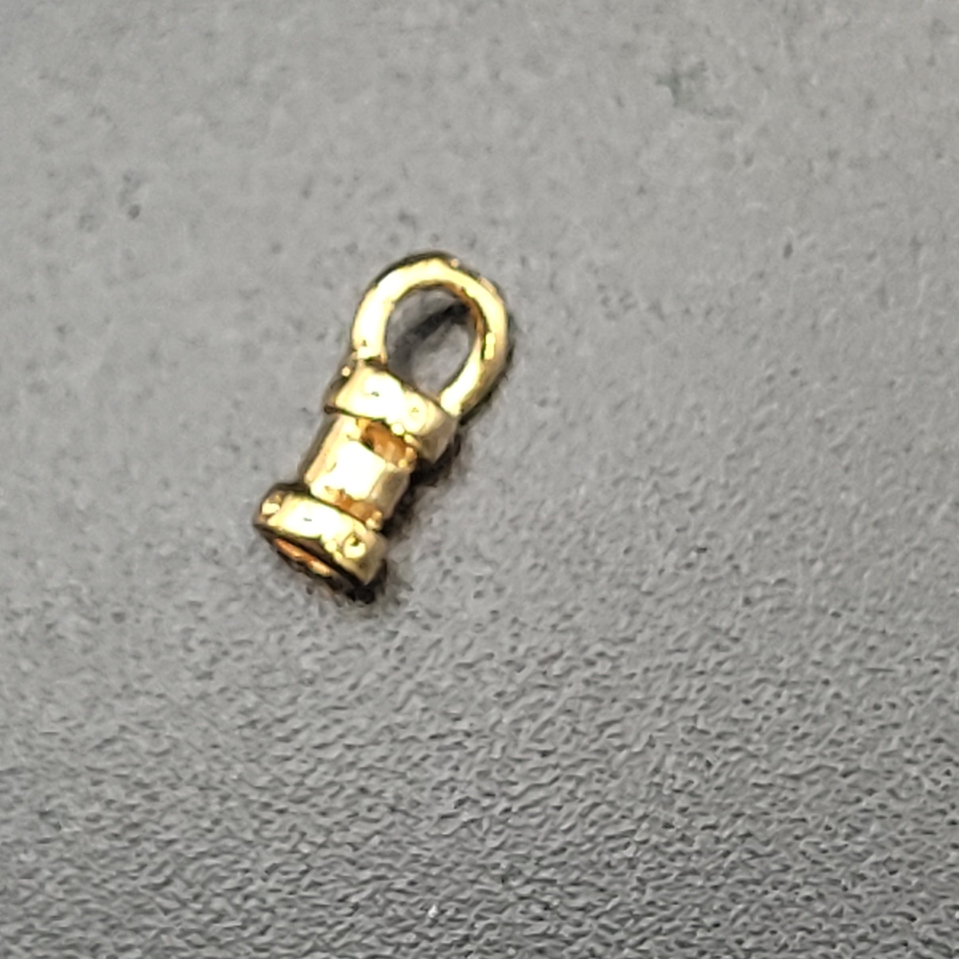 1.5mm gold crimp end.