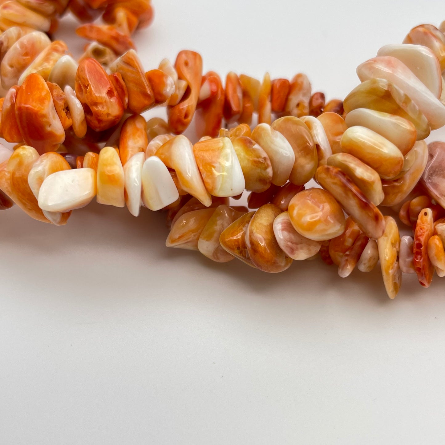 10 to 12mm Red Spiny Oyster Chips Strand.