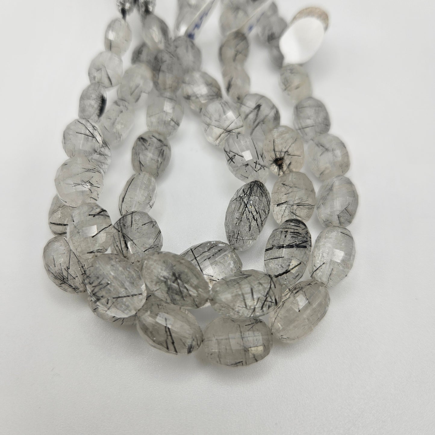 10-12mm Rutilated Quartz Faceted Barrel Bead Strand.