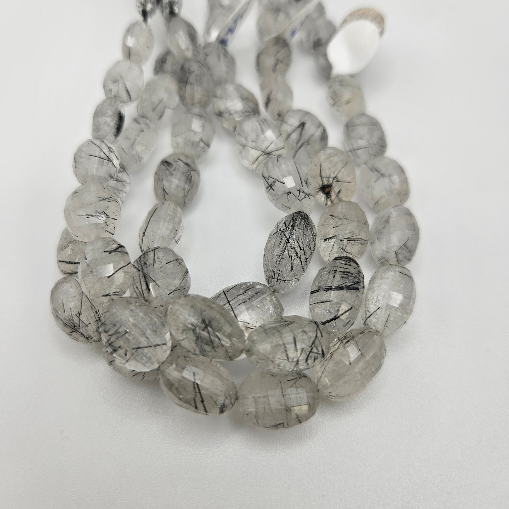 10-12mm Rutilated Quartz Faceted Barrel Bead Strand.