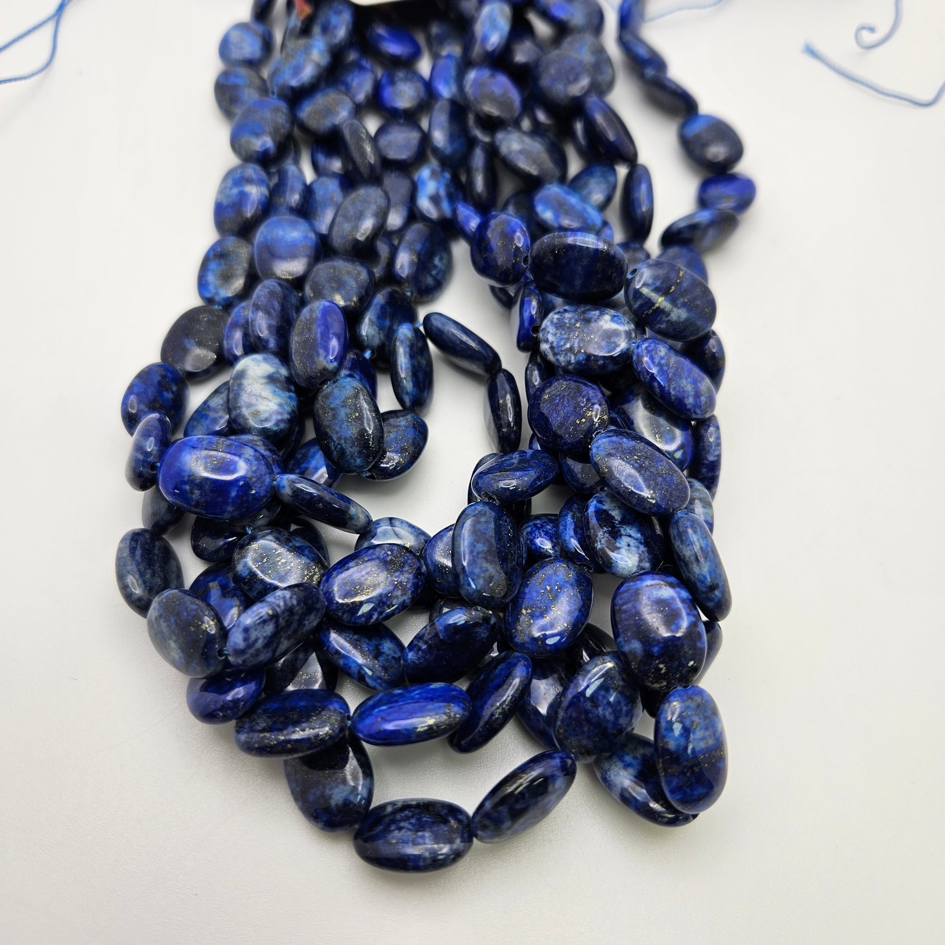 10 to 12mm Lapis Lazuli Oval Coin Beads.