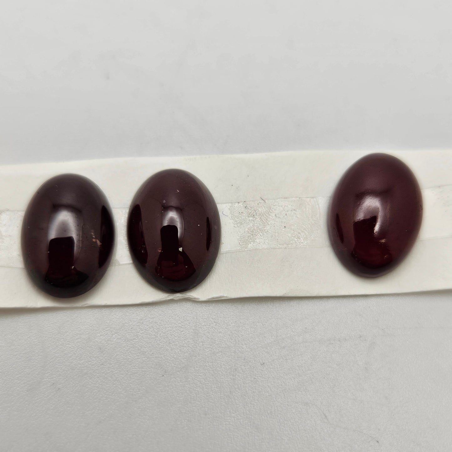 10x14mm Garnet Oval Cabochon.