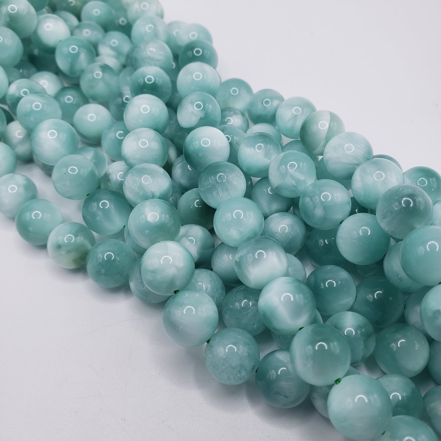 10mm green moonstone bead strand.