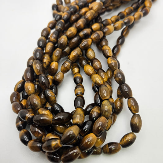 10x3mm Tiger's Eye Rice Shape Bead Strand.