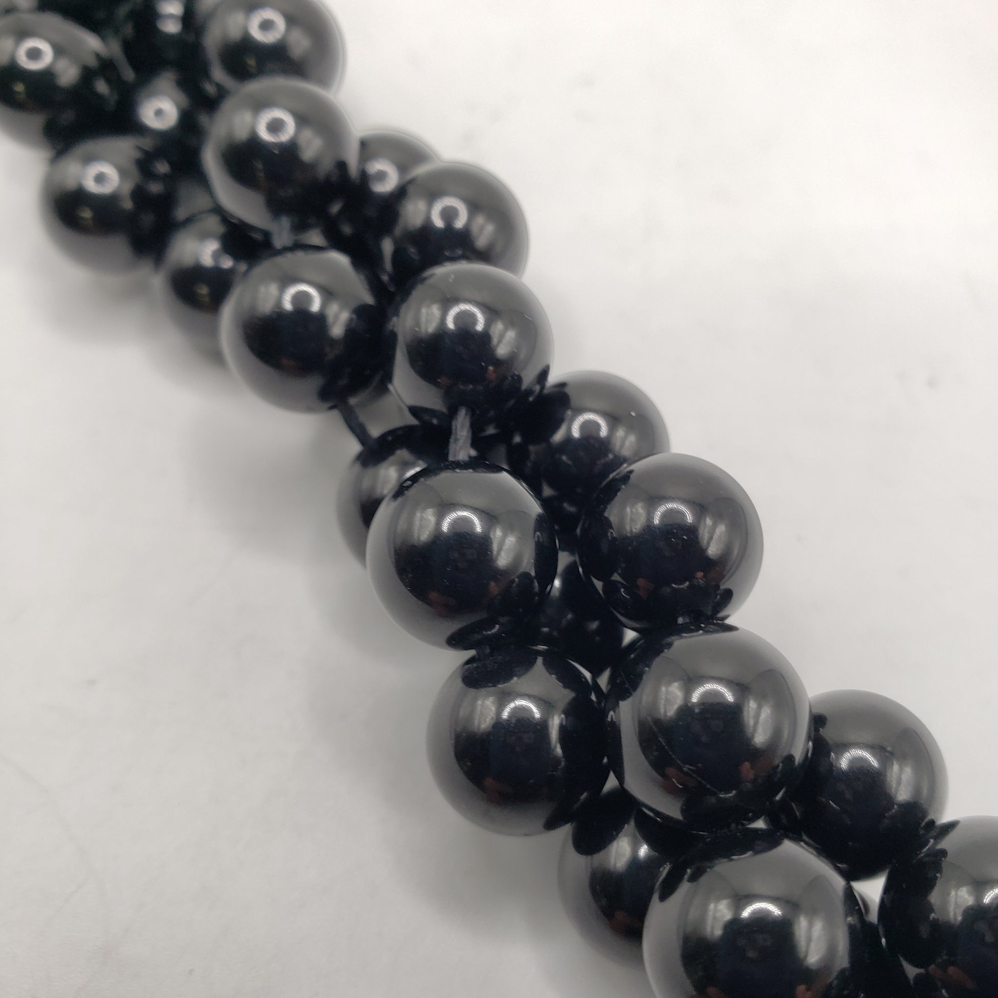 10mm Round Black Spinel Bead Strand.