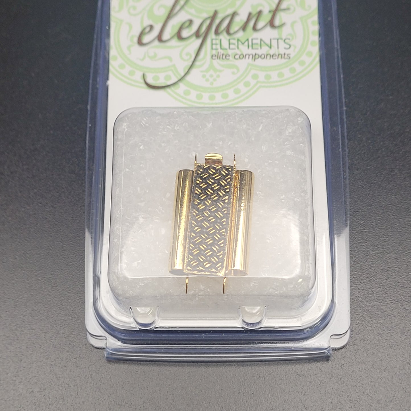 10MM X 18MM ANTIQUE GOLD BEADSLIDE/ BOX CLASP CROSS HATCH PATTERN.