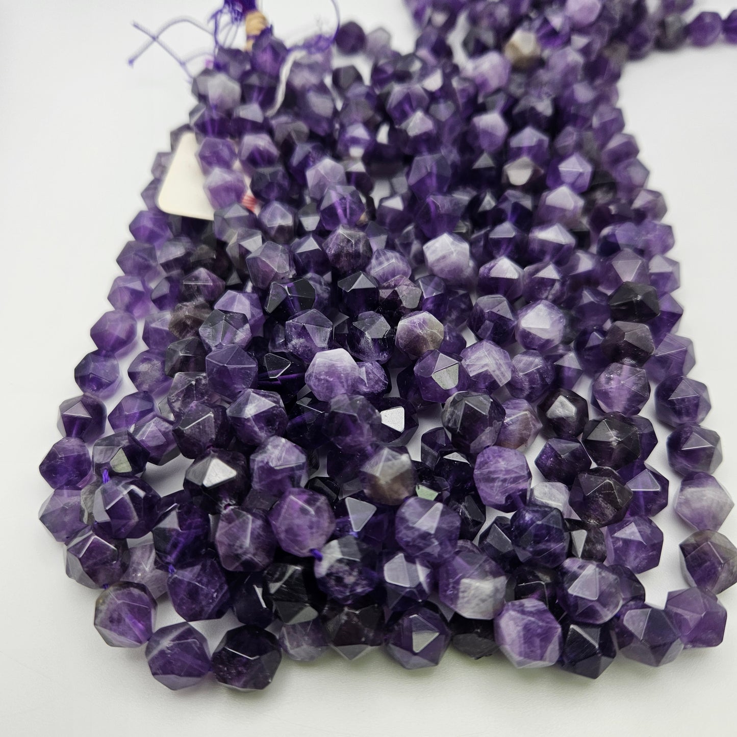 10mm Amethyst Fancy Cut Faceted Bead Strand.