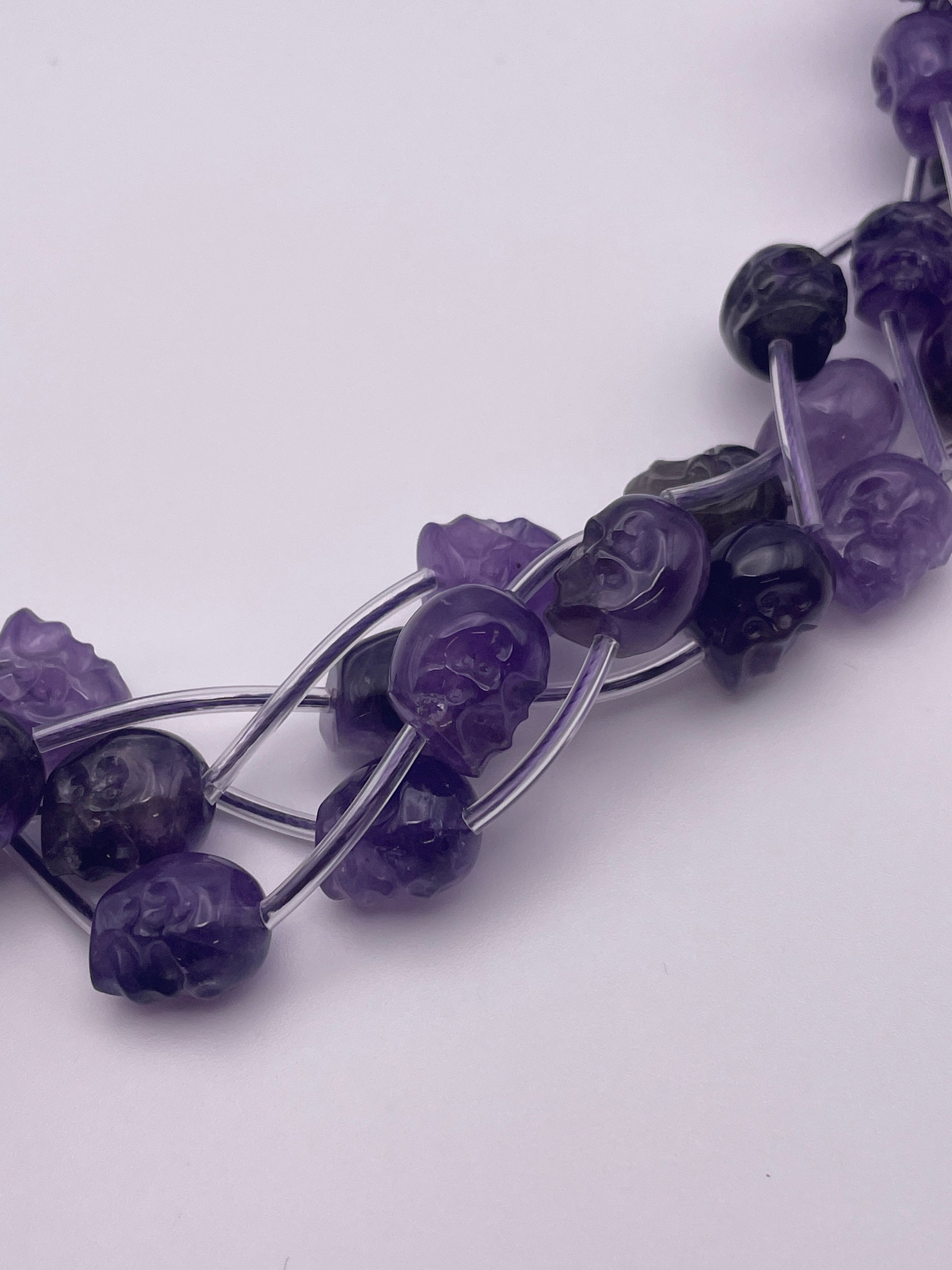 10mm Amethyst Vertical Drill Skull Beads.