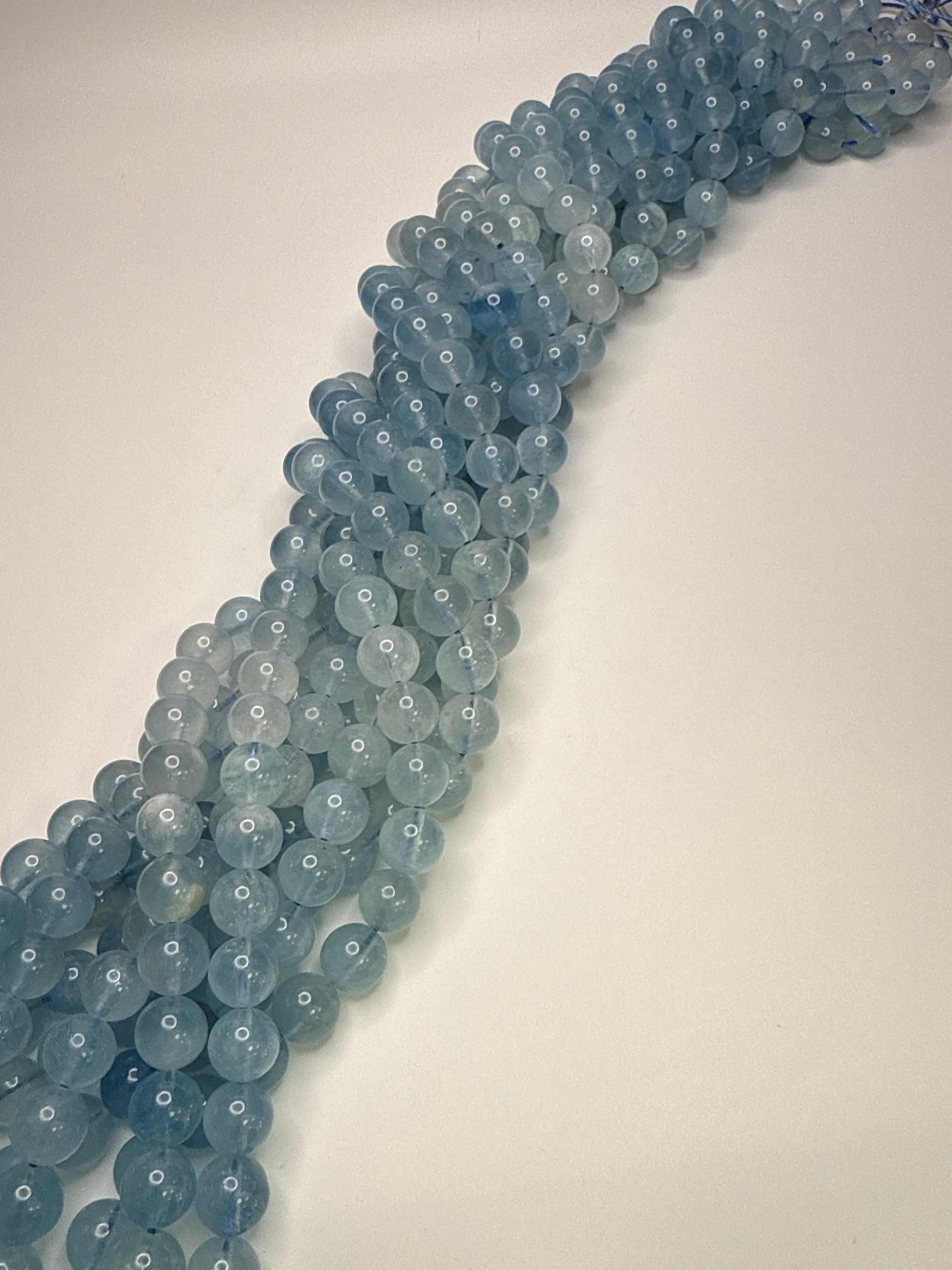 10mm Aquamarine Ombré AA round smooth.