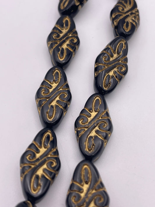 10mm Black and Gold Pattern Rhombus Czech Bead Strand.