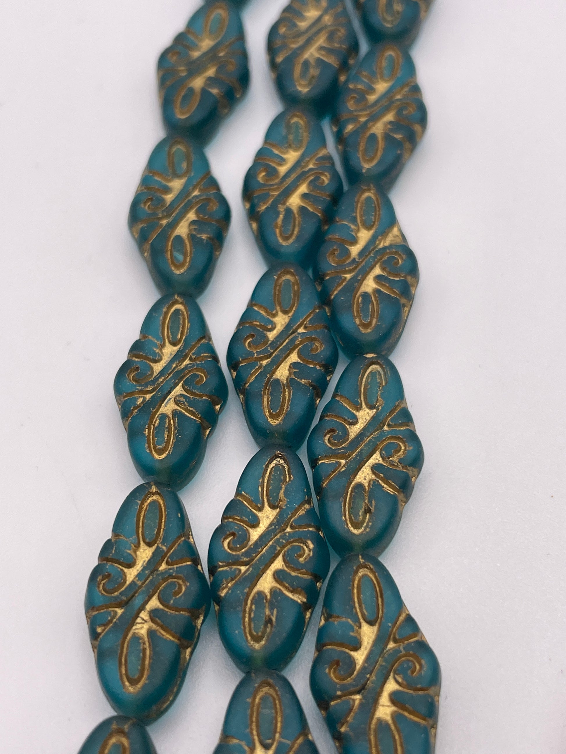 10mm Blue and Gold Pattern Rhombus Czech Bead Strand.