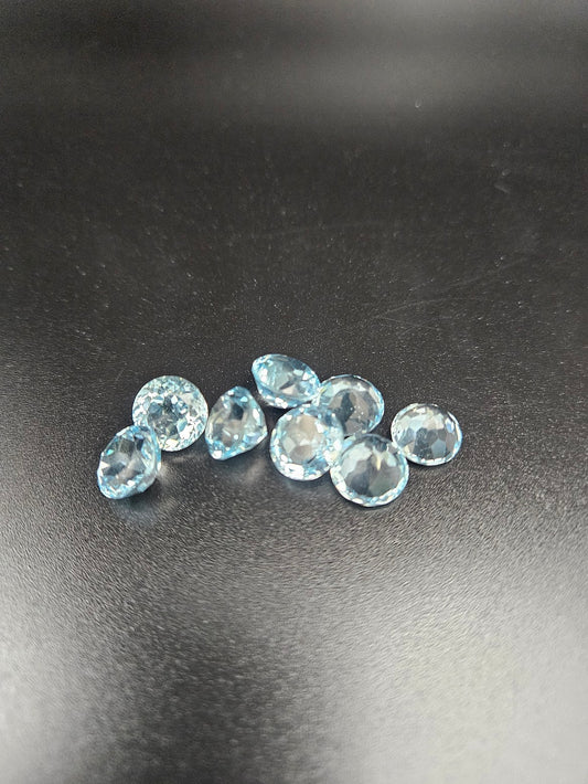 10mm-Blue-Topaz-Round-Cut-facets