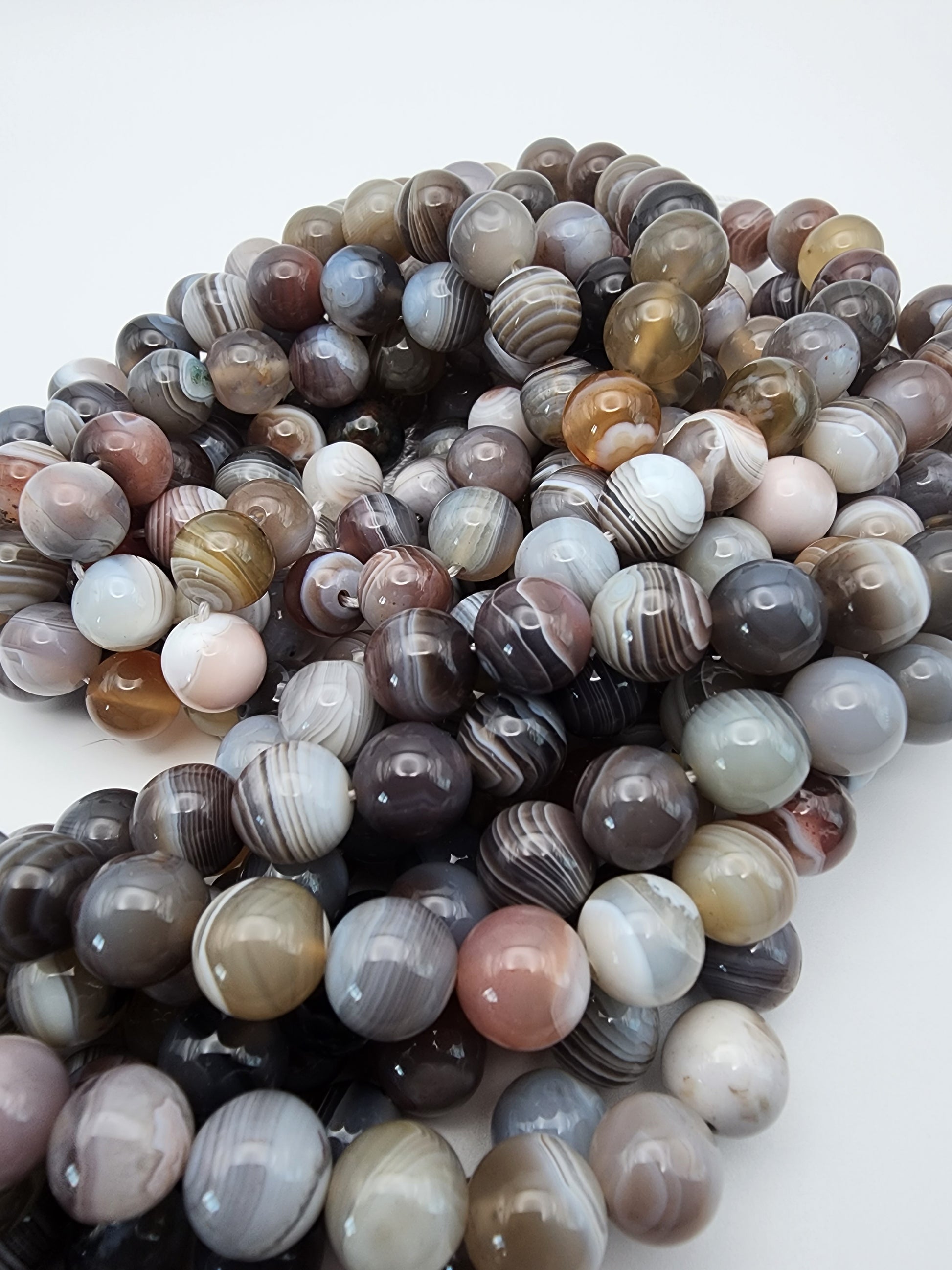 10mm Botswana Agate Round Twist.