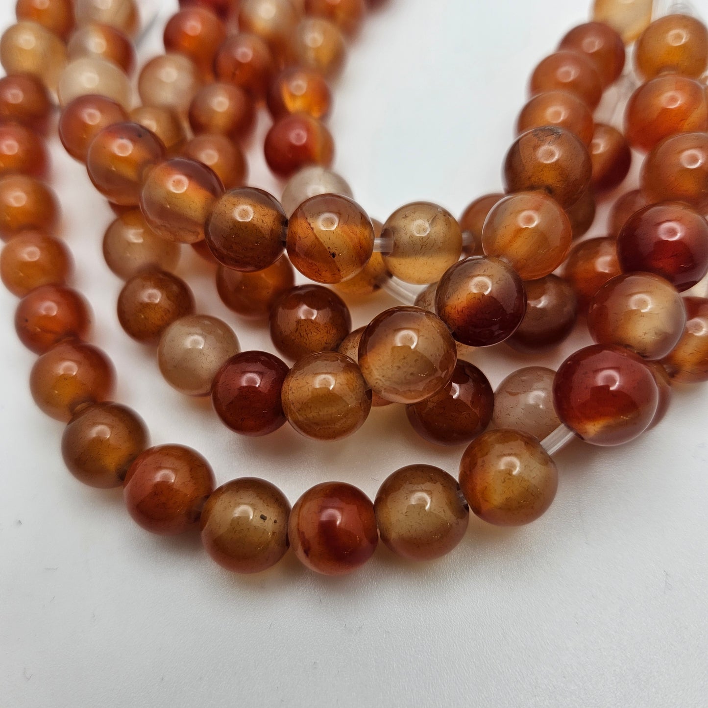 10mm Carnelian Large Hole Round Bead Strand.