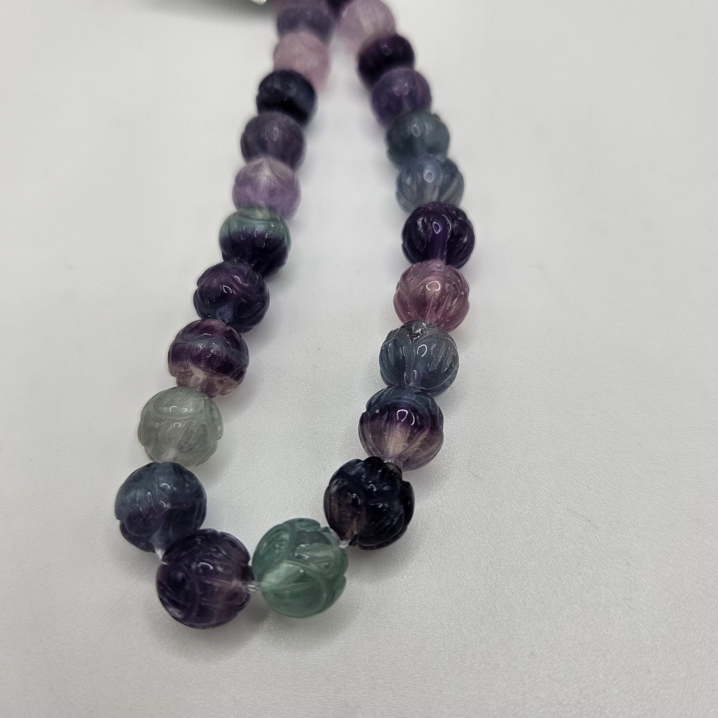 10mm Carved Fluorite Round Single Bead.