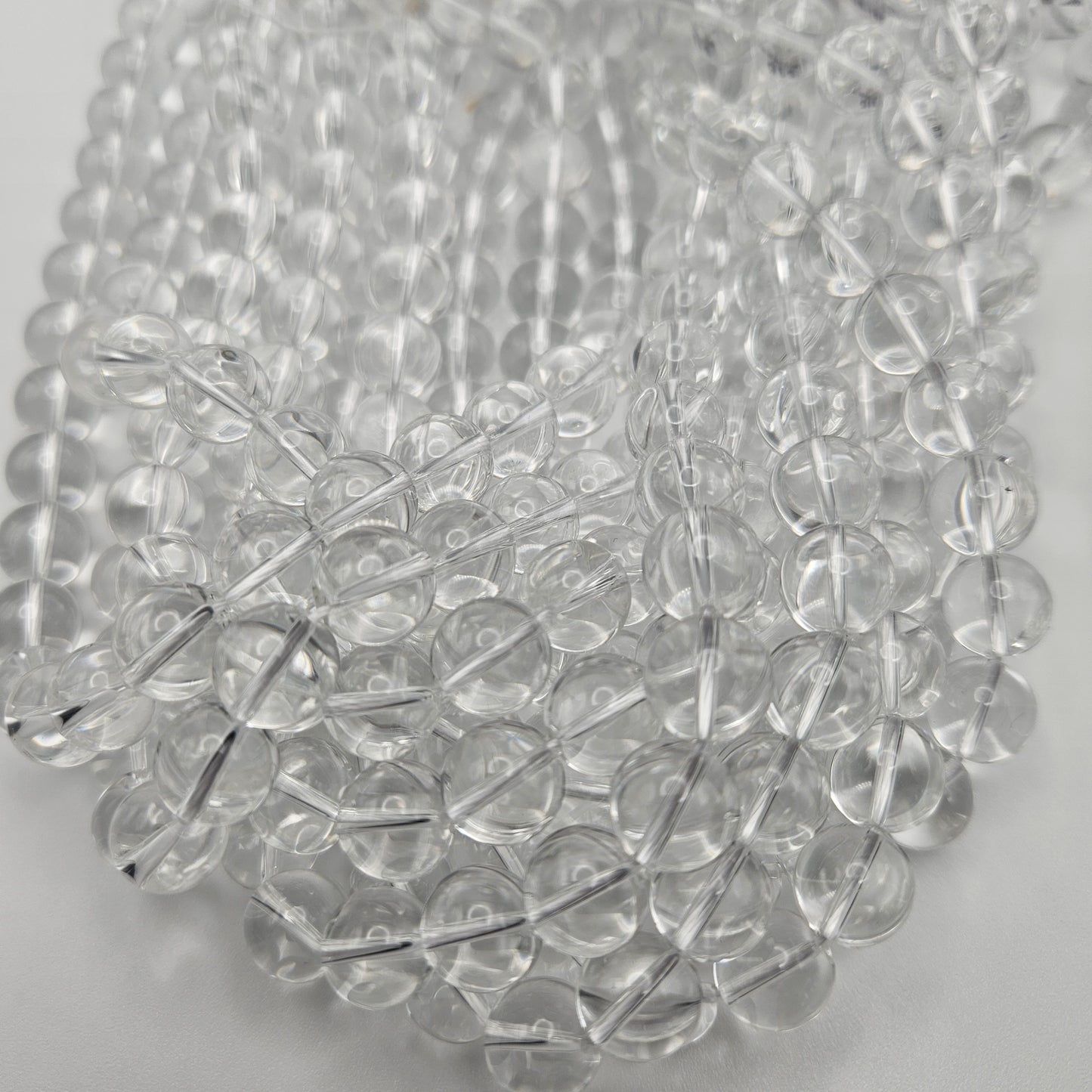 10mm Clear Quartz Round Bead Strand.
