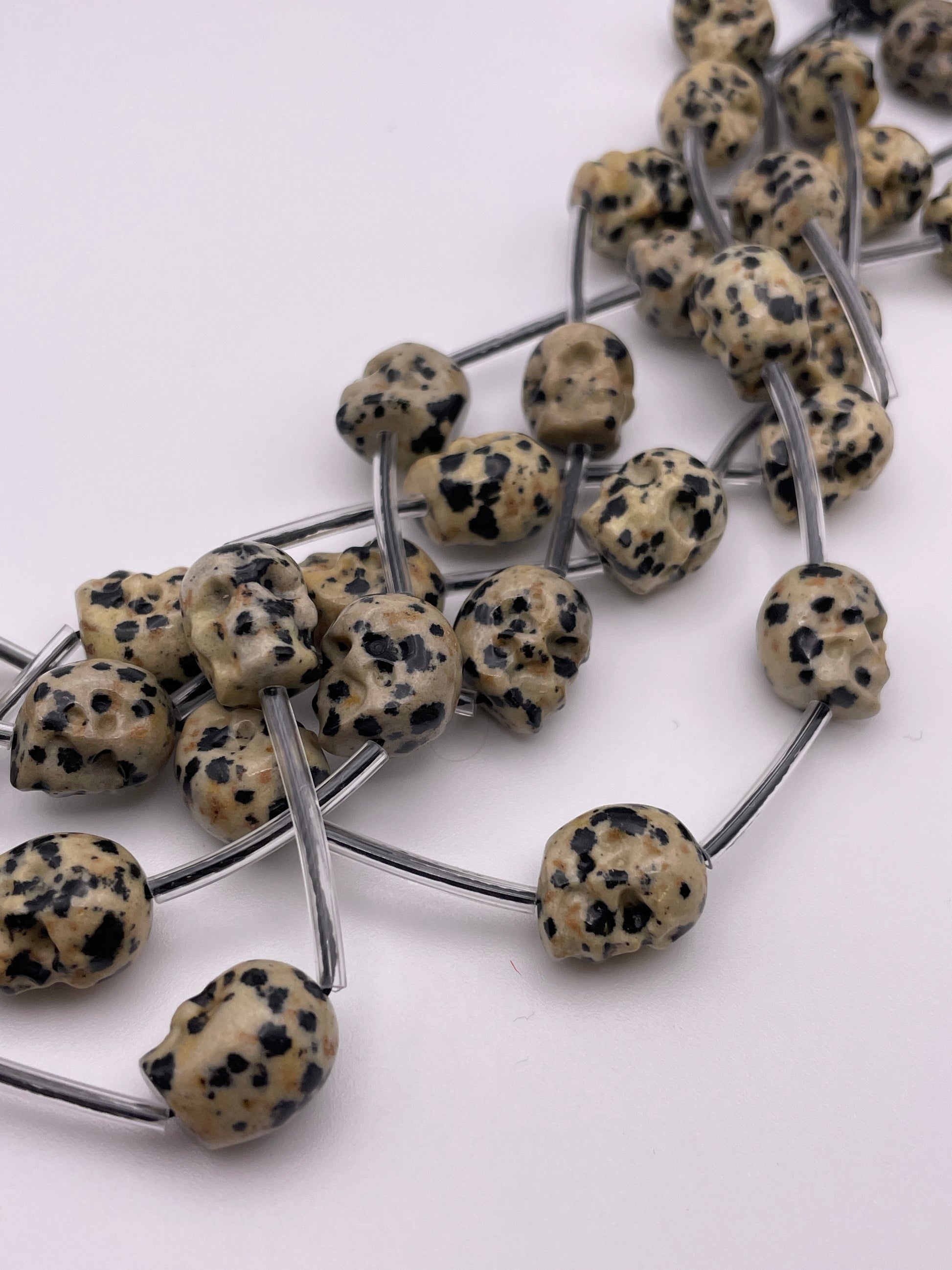 10mm Dalmatian Jasper Skull Beads Vertical Drill.