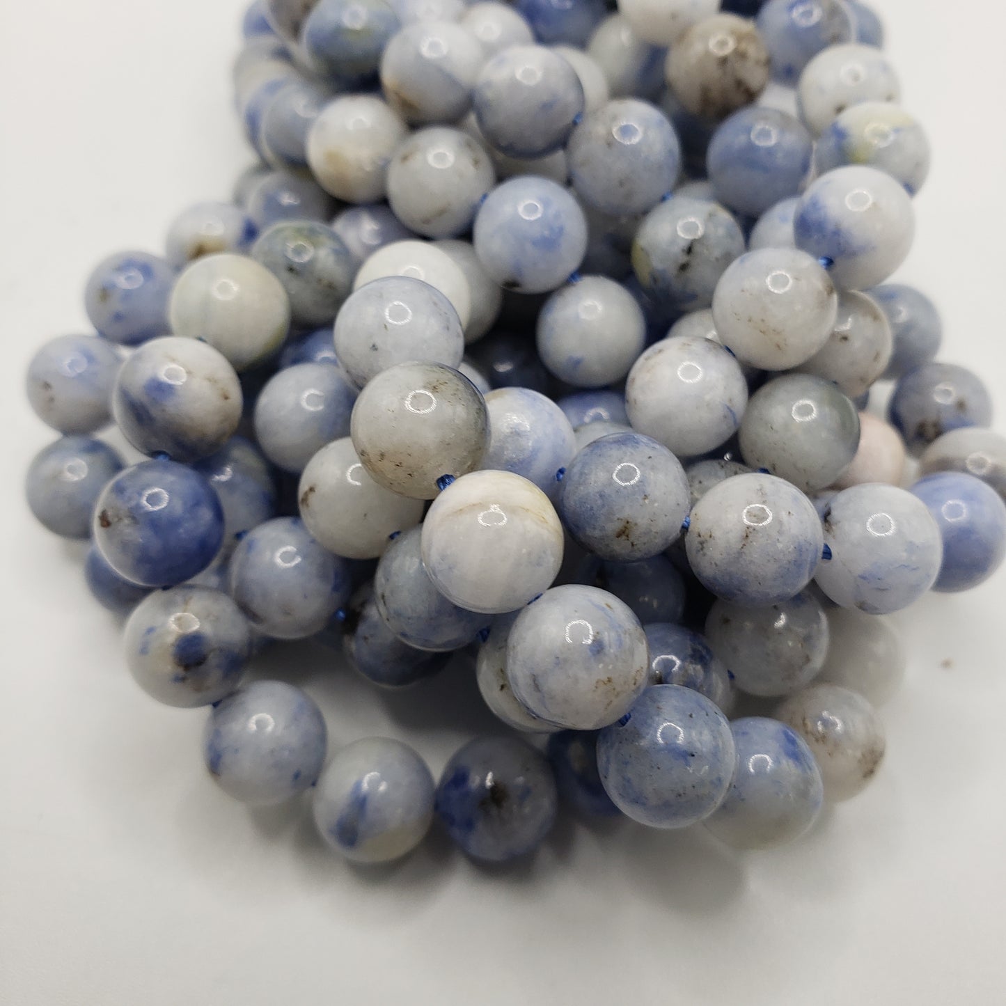 10mm Dumortierite In Quartz Bead Strand.
