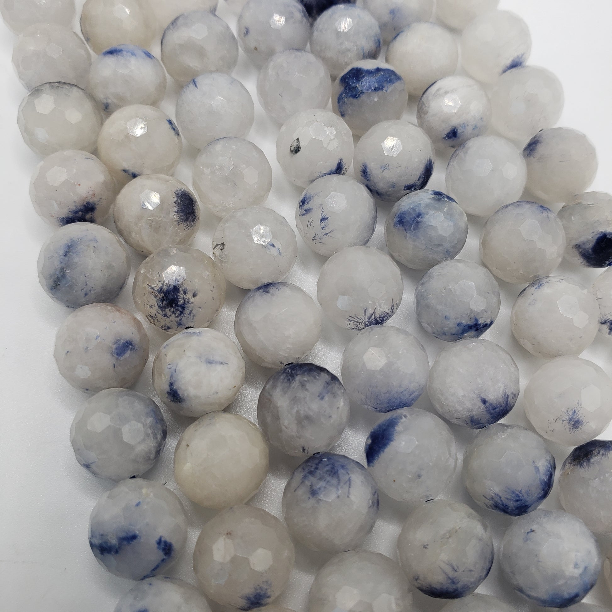 10mm Dumortierite in Quartz Faceted.