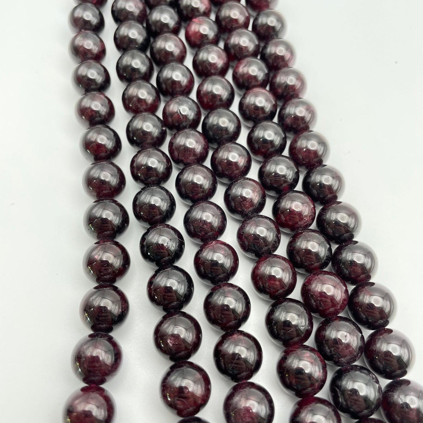 10mm-Garnet-Round Smooth Strand.