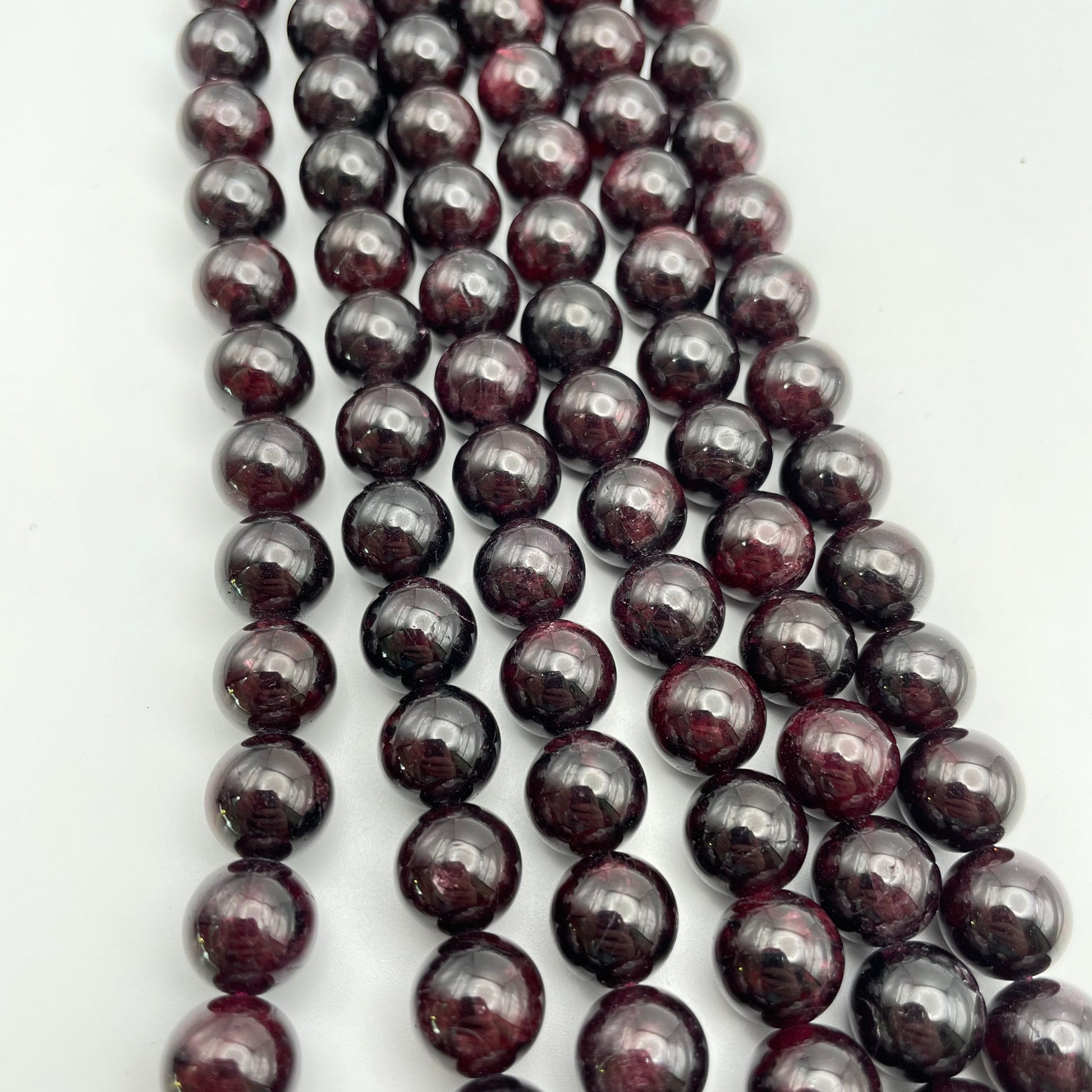 10mm-Garnet-Round Smooth Strand.
