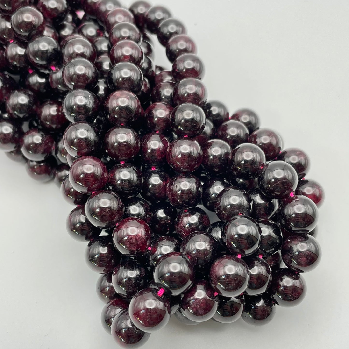 10mm Garnet Round Smooth Twist