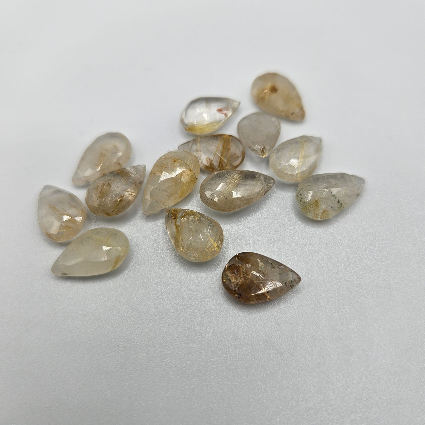 10mm gold rutilated quartz top drill single bead.