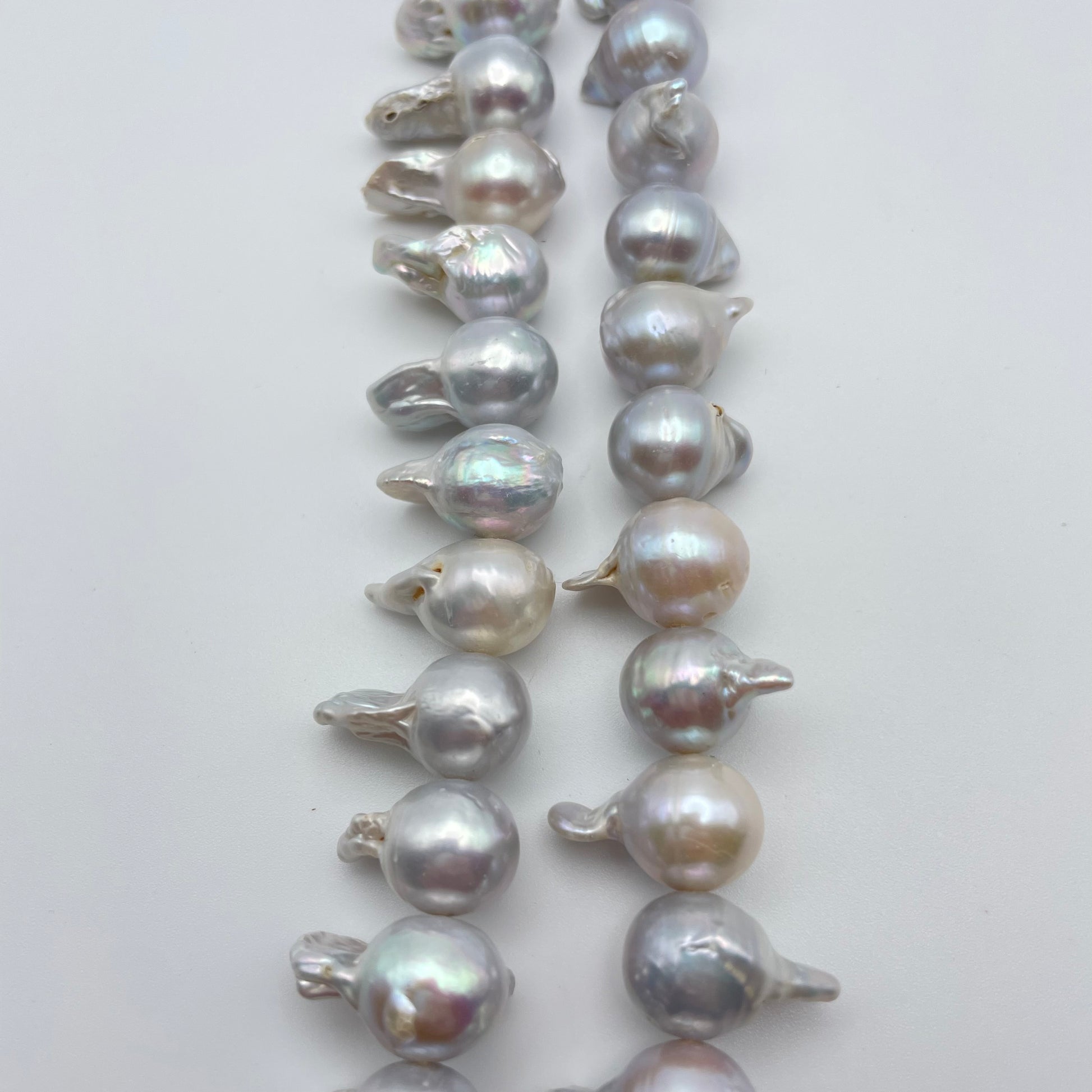 10mm Grey Pearl Irregular Strand.