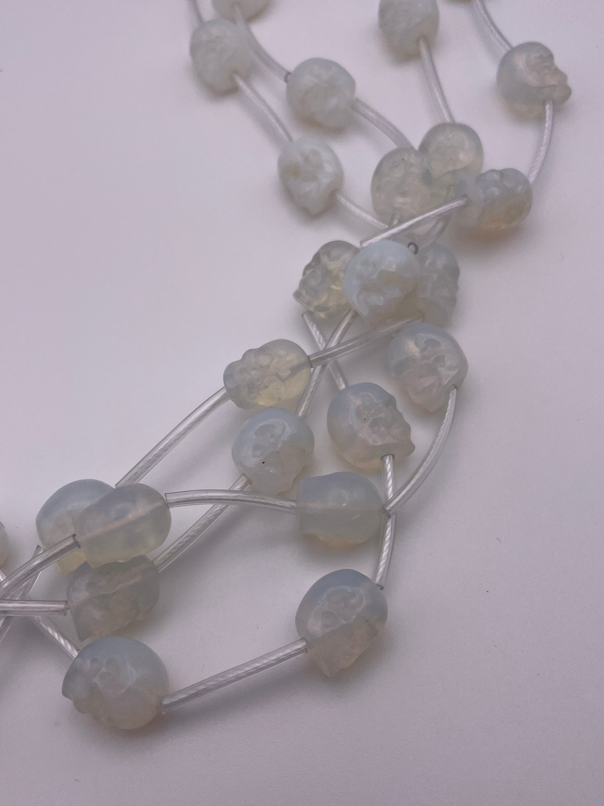 10mm Opalite Skull Bead Strand.
