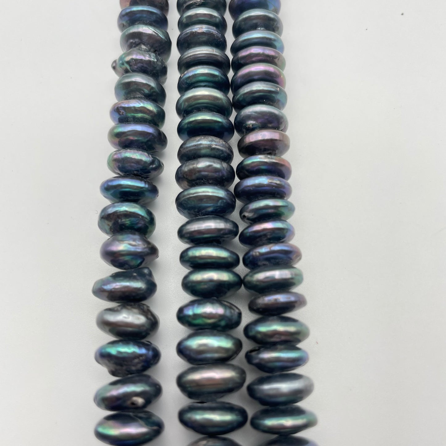 15 Inch Long Strand of 10mm Peacock Heshi Shape Pearl Beads.