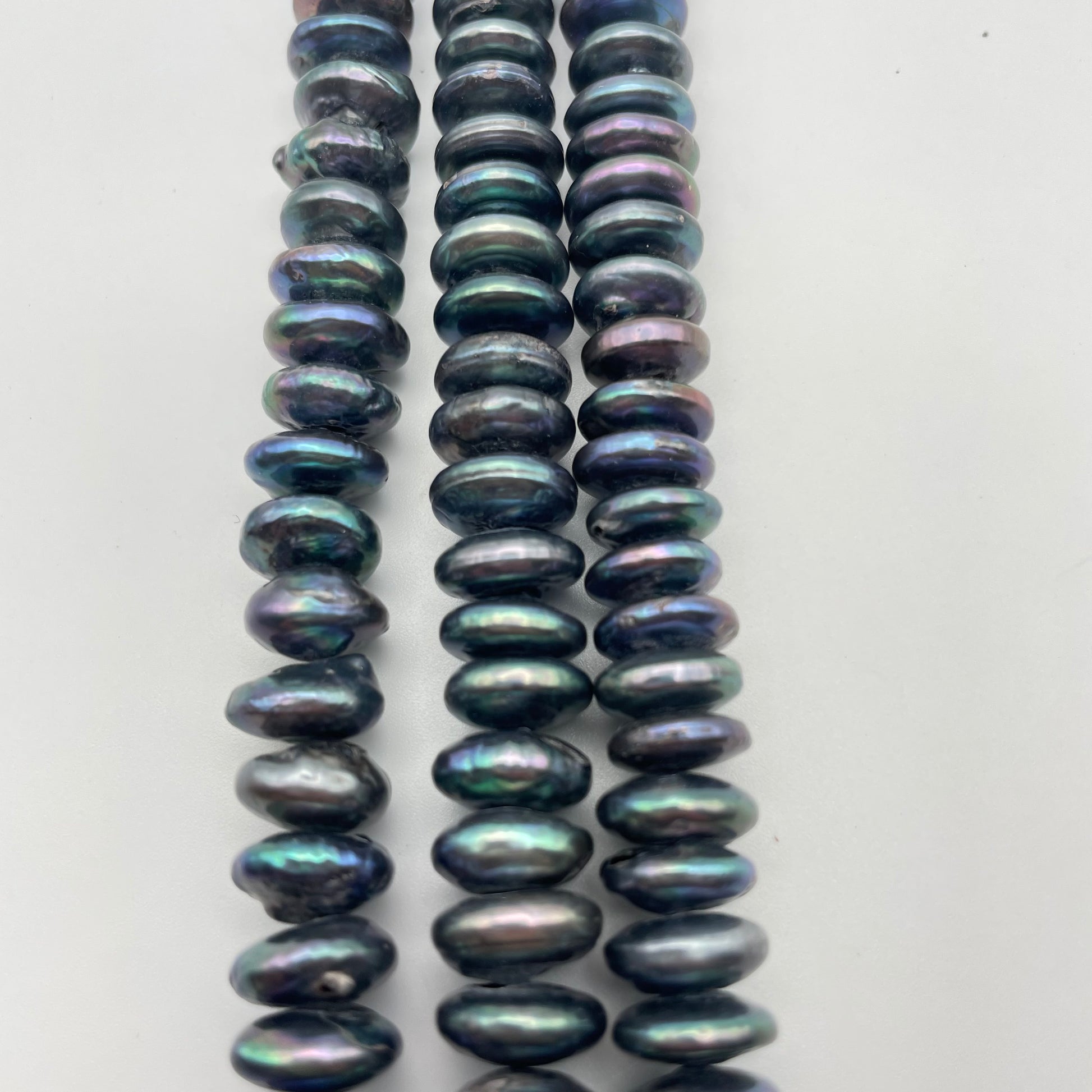 15 Inch Long Strand of 10mm Peacock Heshi Shape Pearl Beads.