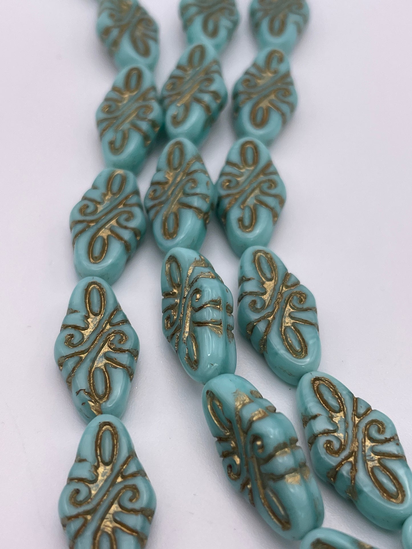 10mm Teal & Gold Pattern Rhombus Czech Bead Strand.