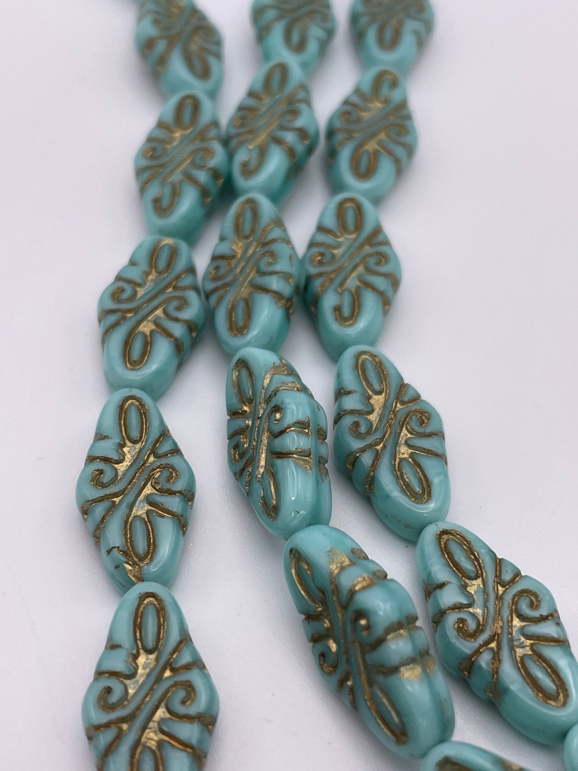 10mm Teal & Gold Pattern Rhombus Czech Bead Strand.