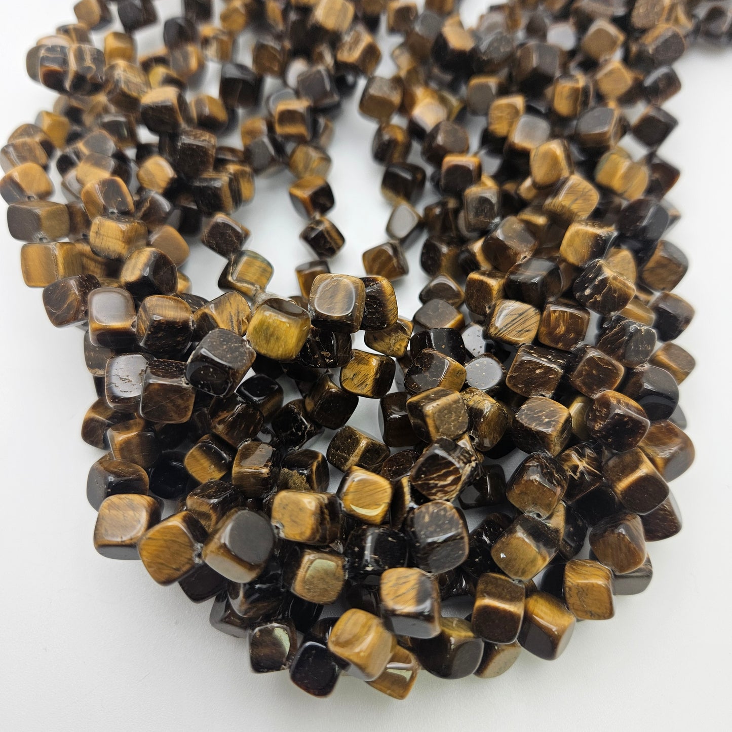 10mm Tiger's Eye Diagonal Bead Strand.