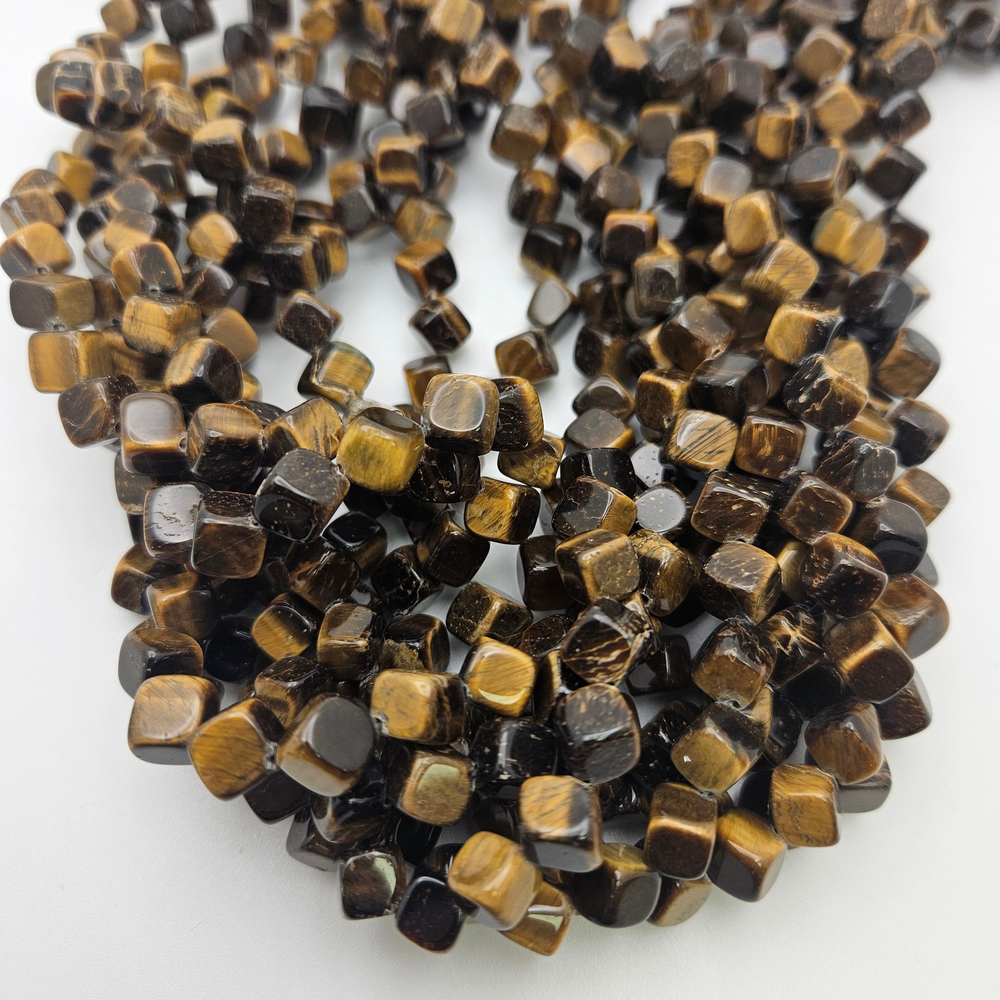 10mm Tiger's Eye Diagonal Bead Strand.