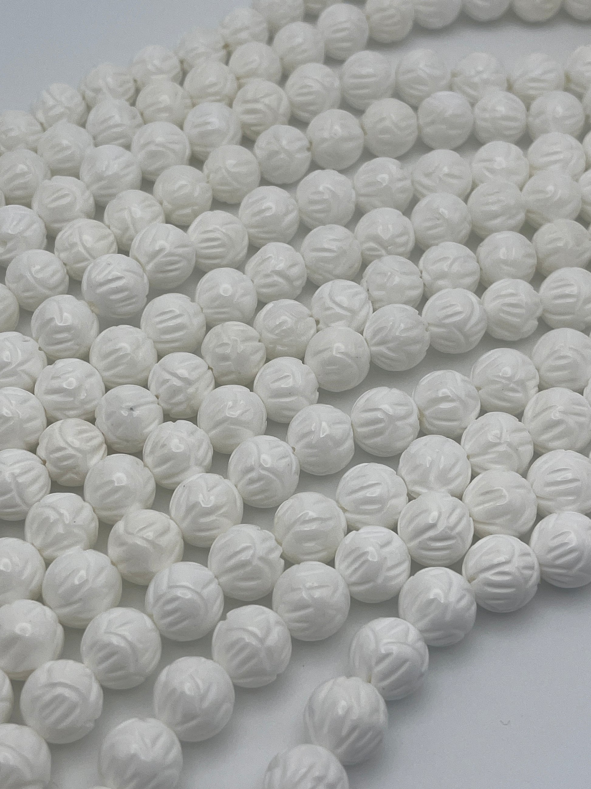 10mm Tridacna Shell Carved Bead Strand.