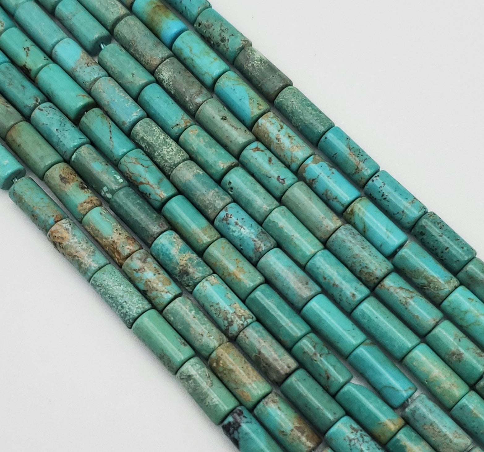 10mm Turquoise Cylinder Bead Strand.
