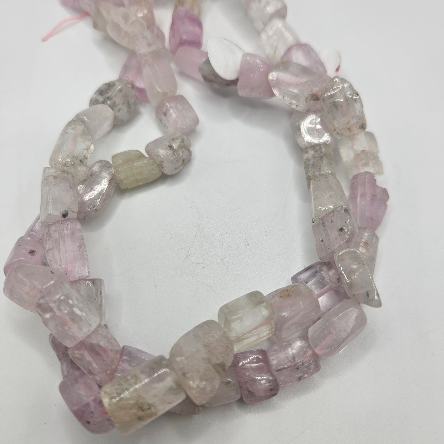 10mm kunzite chunk bead strand.