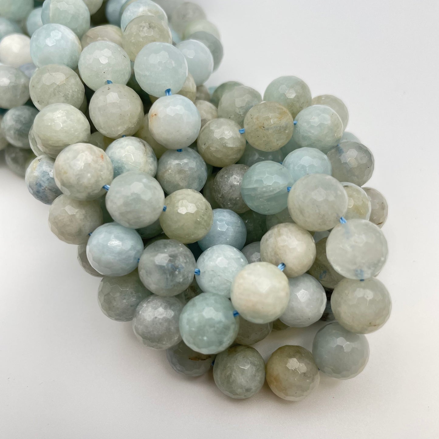 10mm Aquamarine Round Faceted Strand.