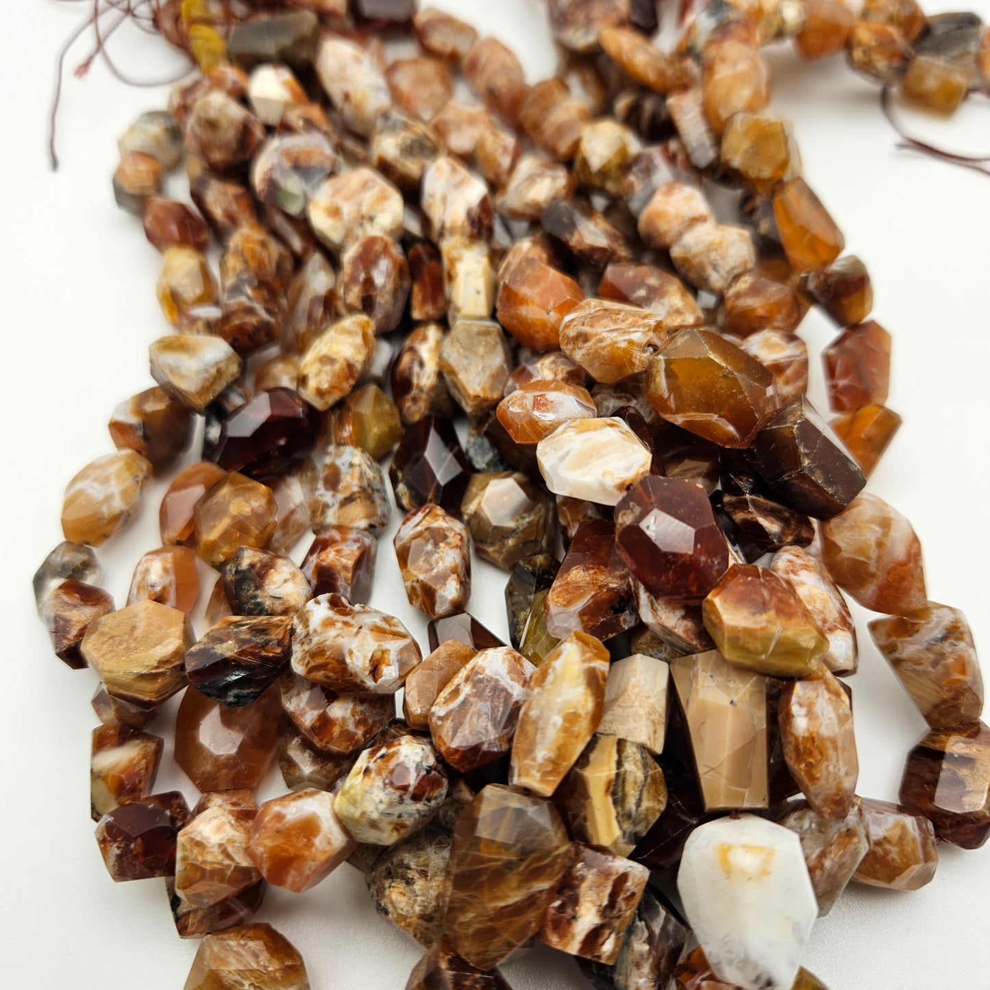 10mm Brandy Opal Faceted Chunk.