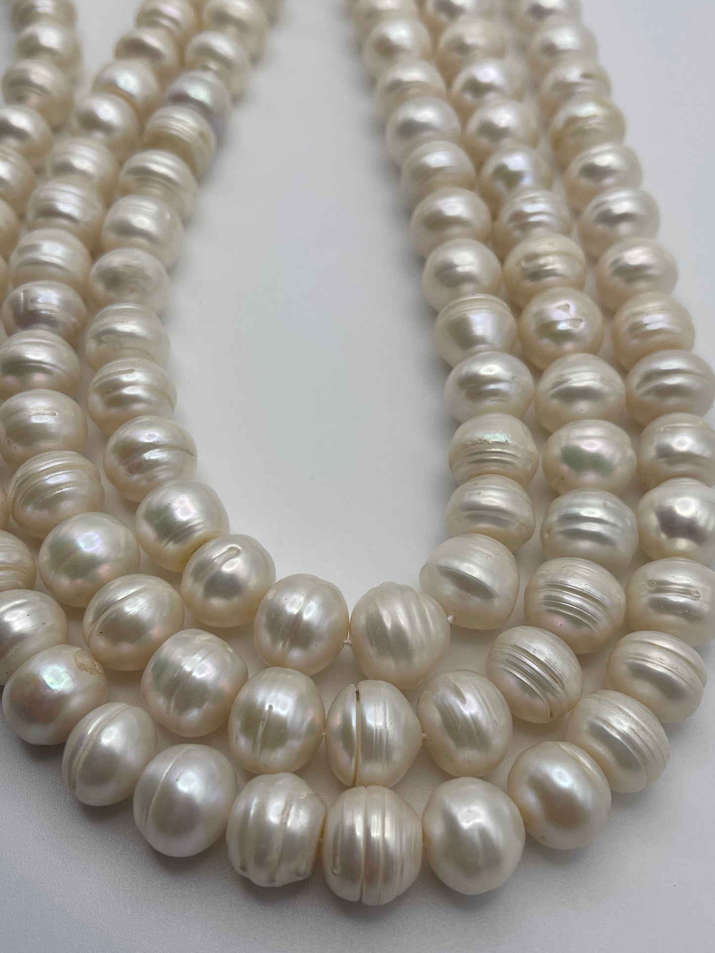 15 Inch Strand of 12 to 13mm white potato pearl beads.