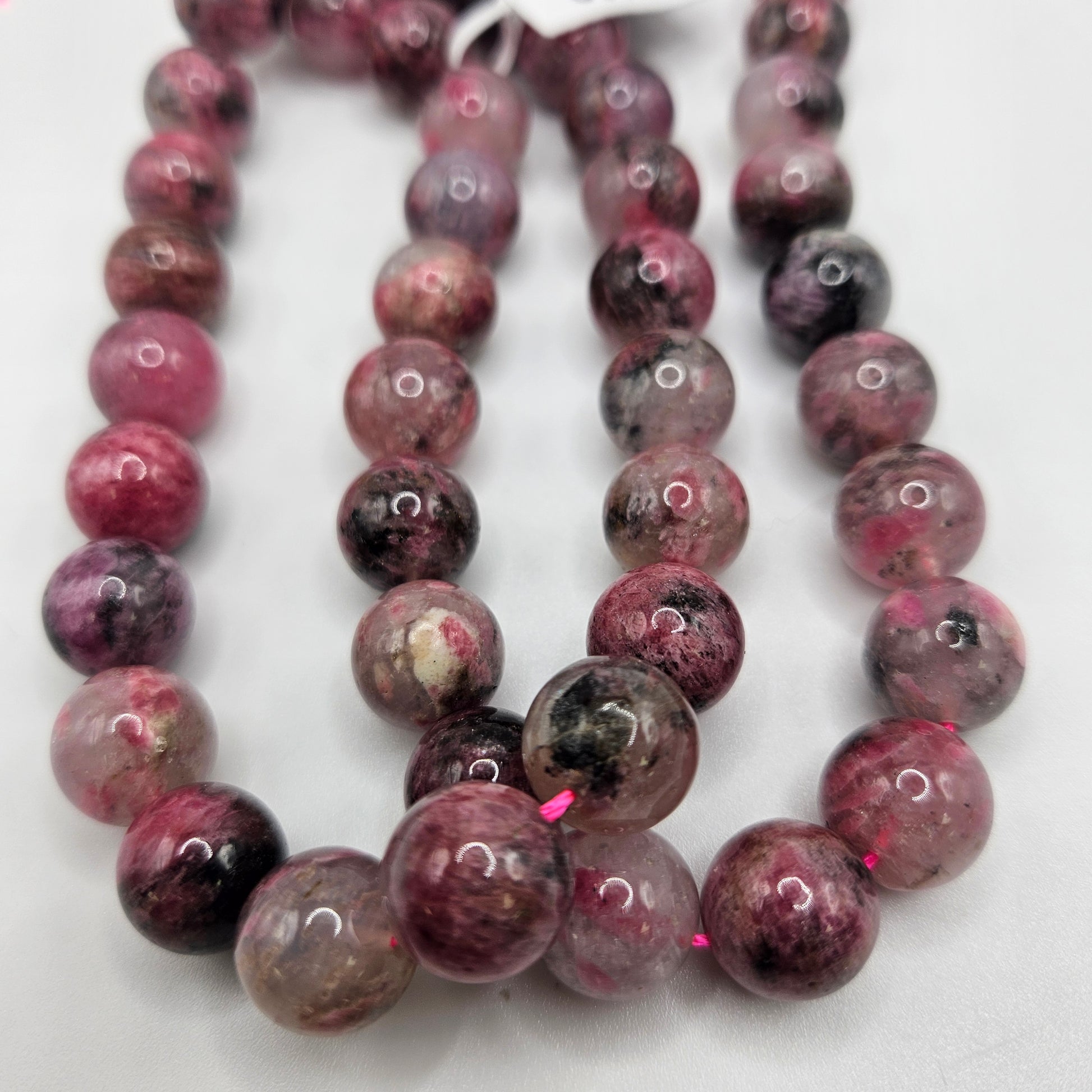 12mm Black Rose Rhodonite Round Bead Strand.