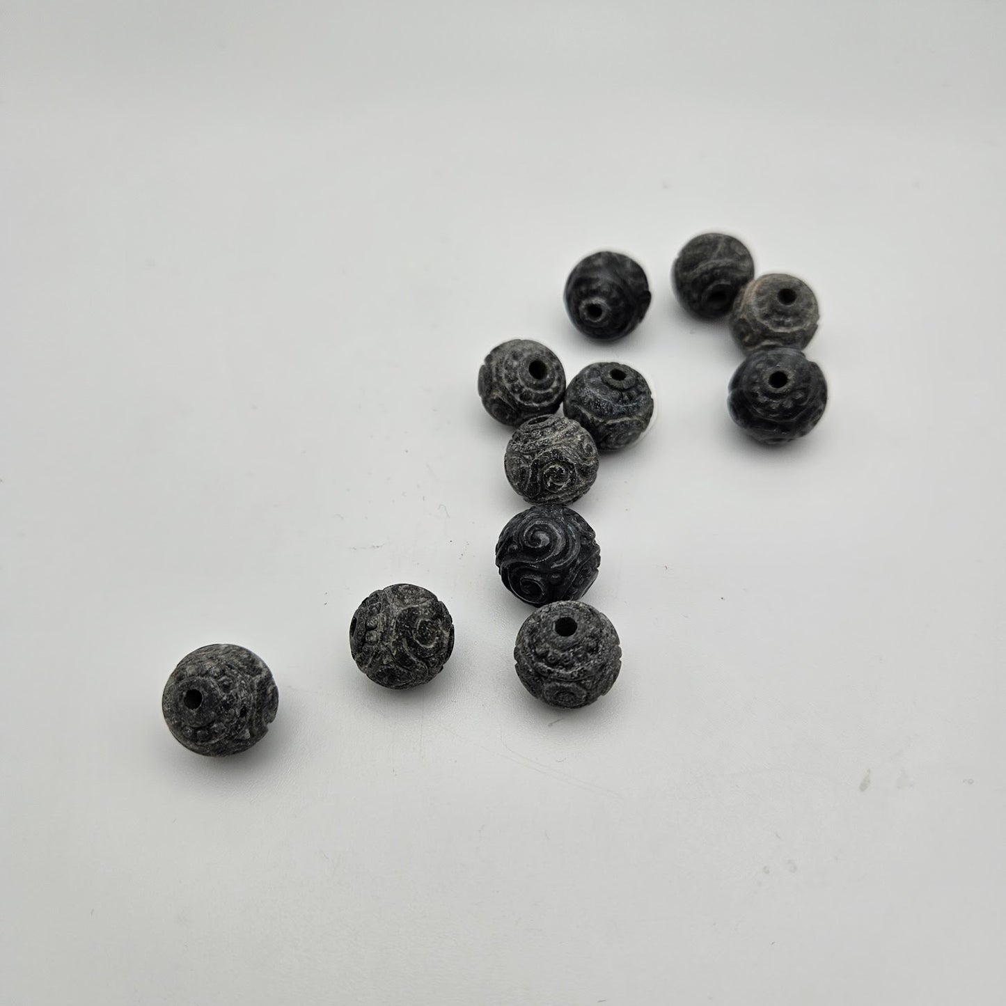 12mm Carved Black Jade Guru Bead.