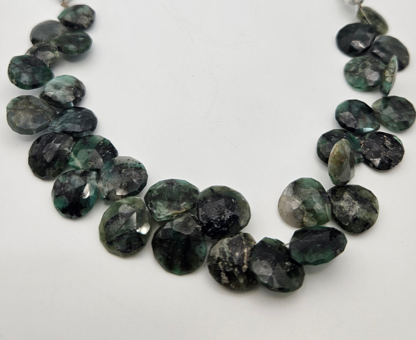 12mm Faceted Emerald Top Drill Bead Strand.