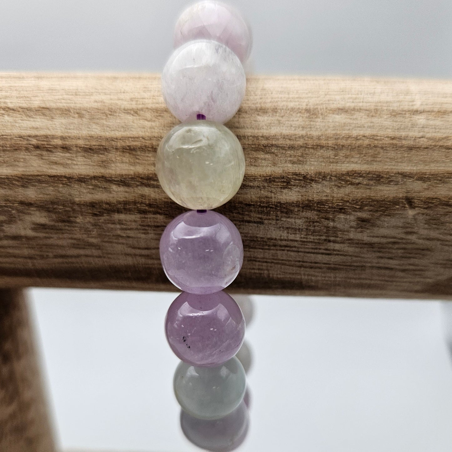 12mm Green And Purple Kunzite Stretch Bracelet.