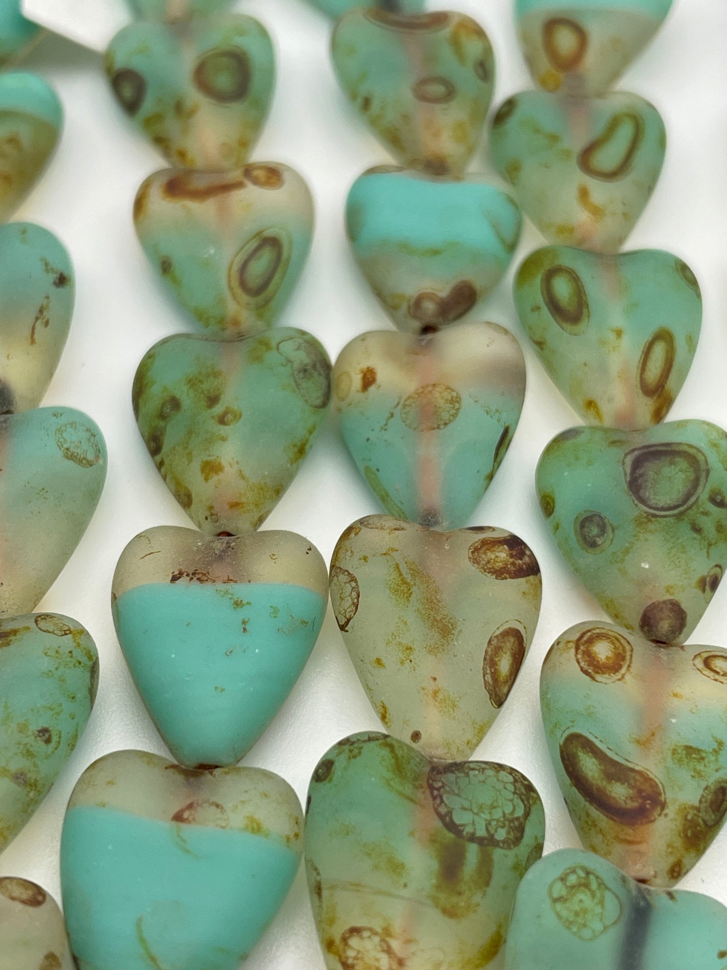13mm Teal Banded Heart Czech Bead Strand.