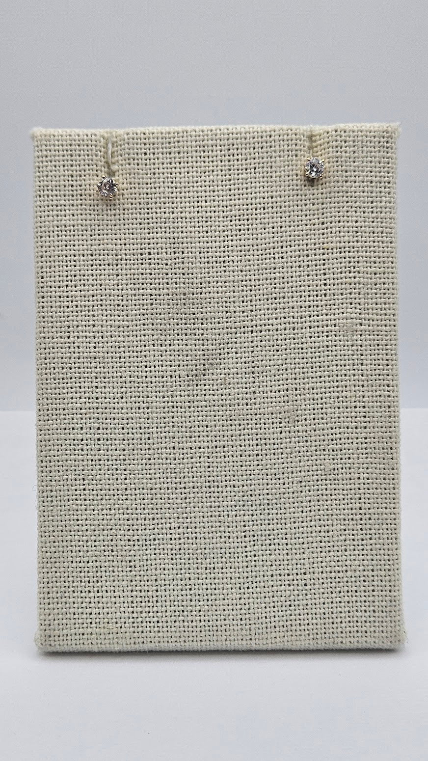 14k Gold Diamond Studs.