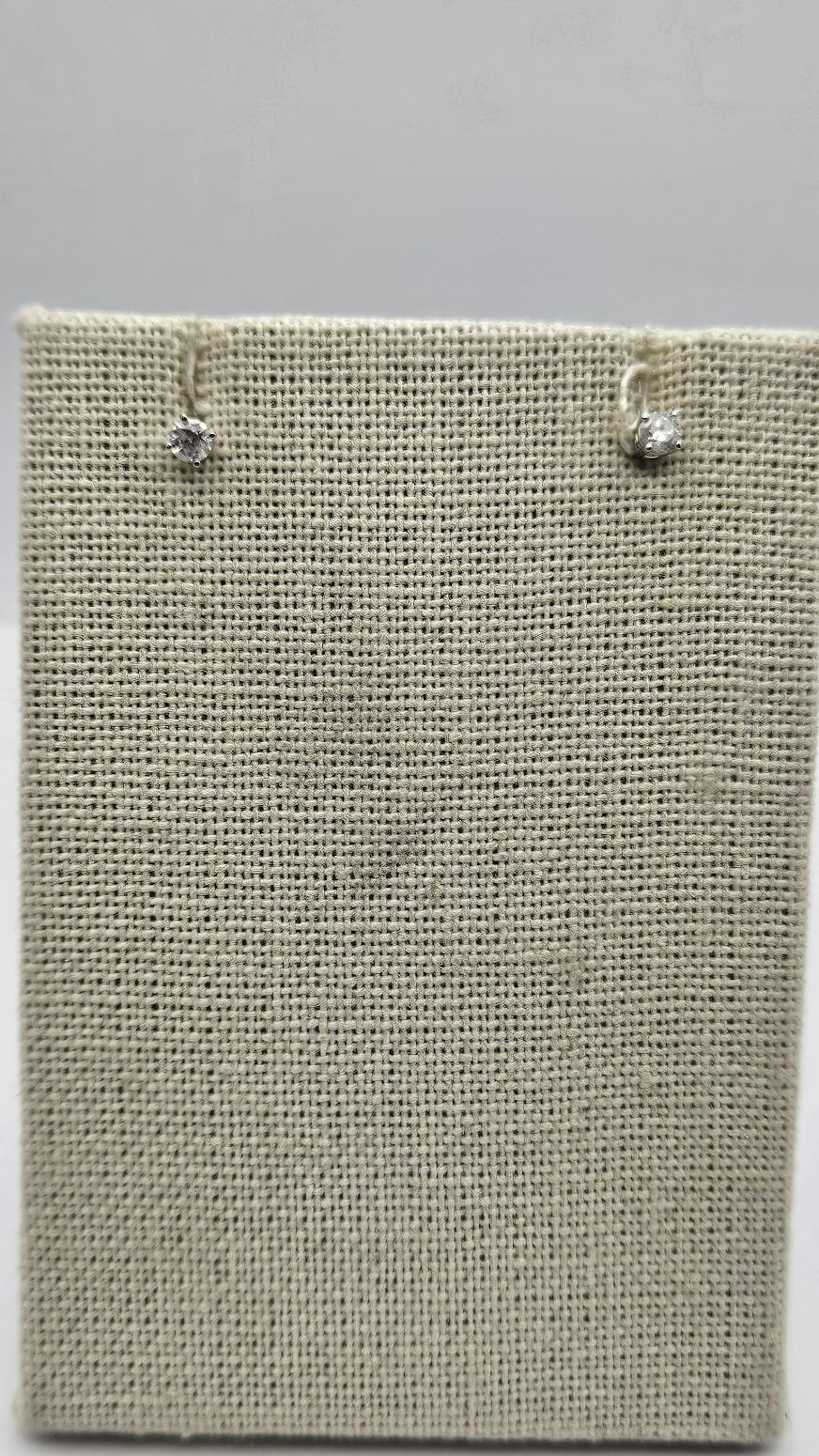 14k White Gold Diamond Studs.