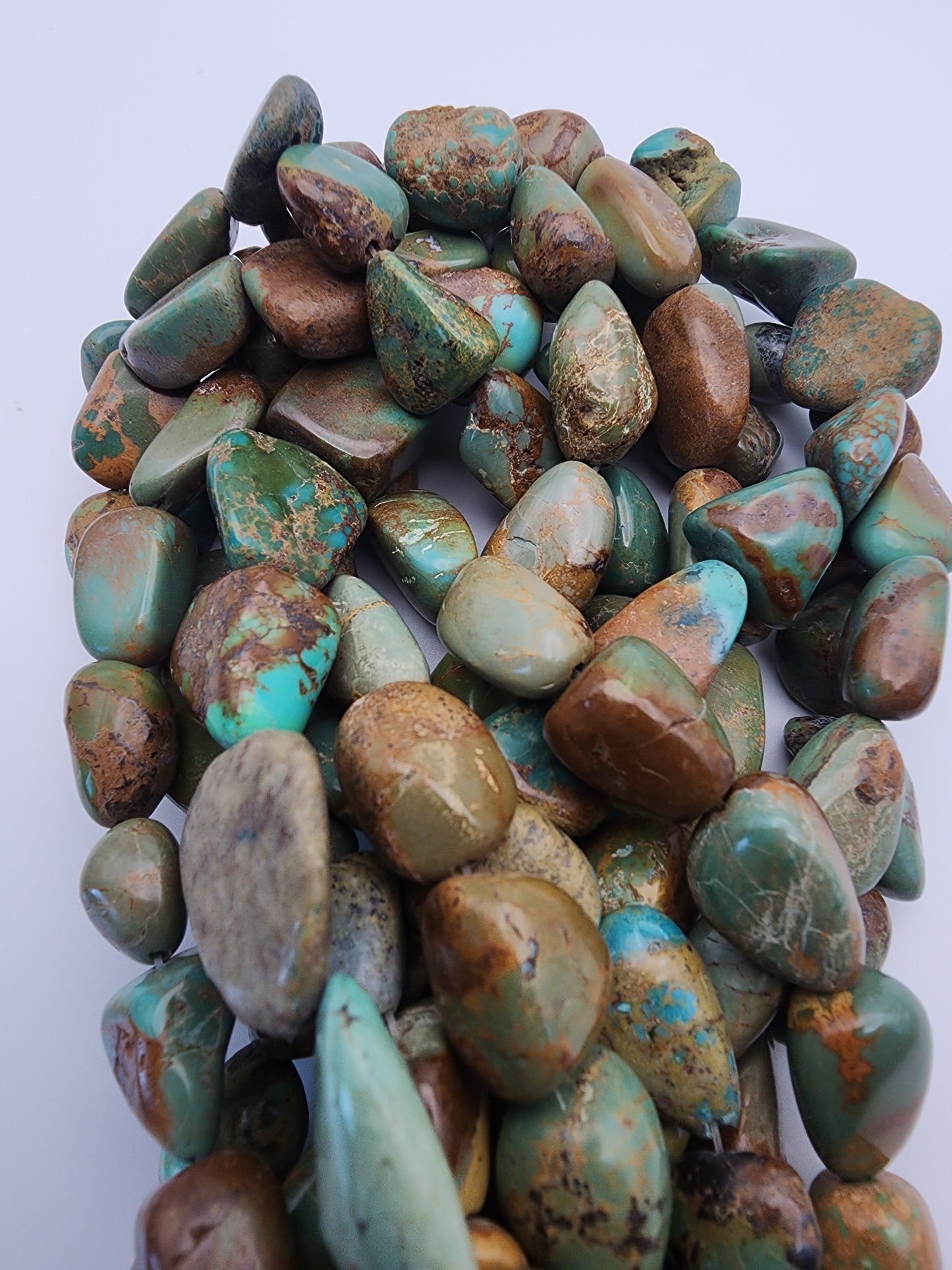 15 Inch long 11mm Turquoise Bead Strand.
