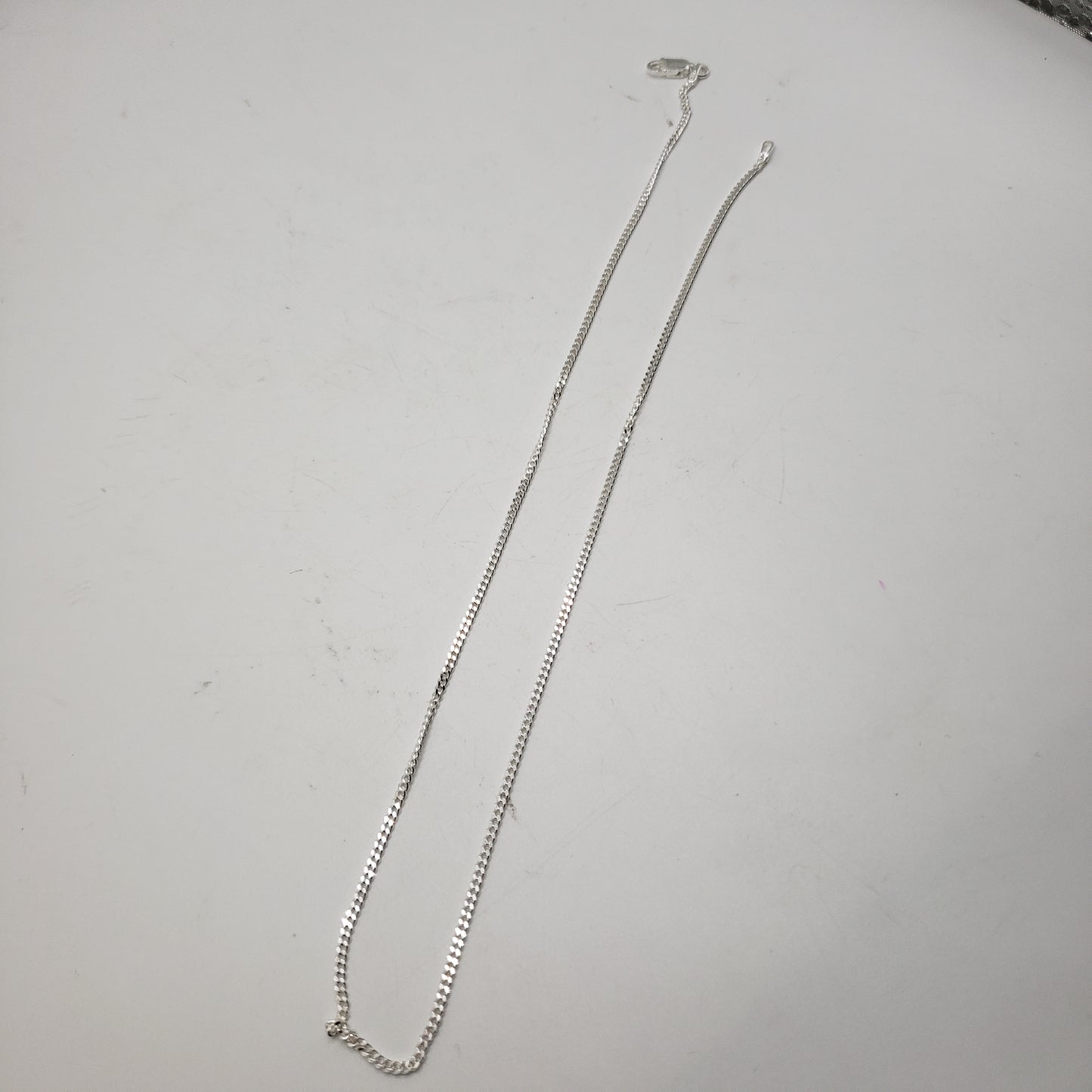 16 Inch Long Sterling Silver Thin Figaro Chain.